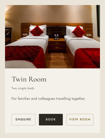 The Twin Room’s card on the hotel’s home page: two single beds, ‘For families and colleagues travelling together’, and the buttons Enquire, Book and View room.