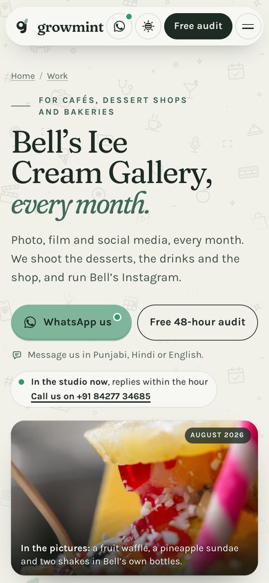 Bell’s page on a phone: ‘Bell’s Ice Cream Gallery, every month.’, WhatsApp us and the free audit, ‘In the studio now’, and a fruit waffle, a pineapple sundae and shakes shot for Bell’s in August 2026.
